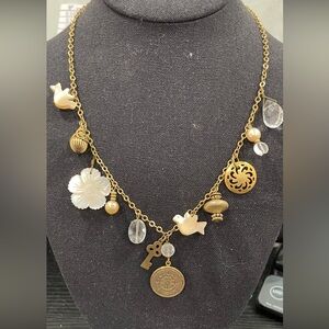 Lenora Dame necklace gold tone dangle charm bird flower mother pearl 19.5”